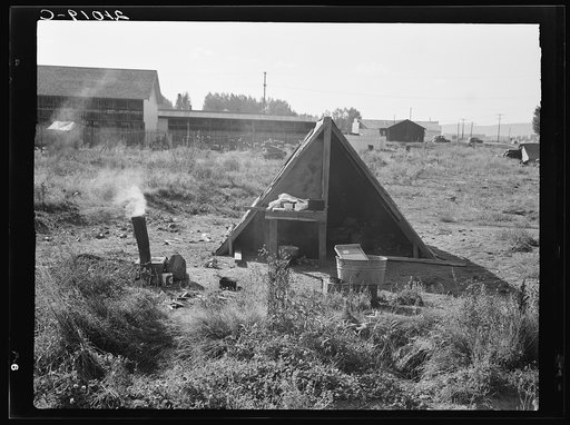 One of the forty potato camps in open field, entering town. Malin, Klamath County, Oregon. General caption number 64