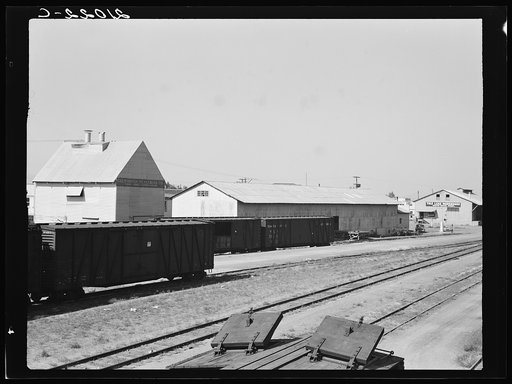 Railroad yard behind potato shed from which Klamath potatoes are shipped across the country. Tulelake, Siskiyou County, California