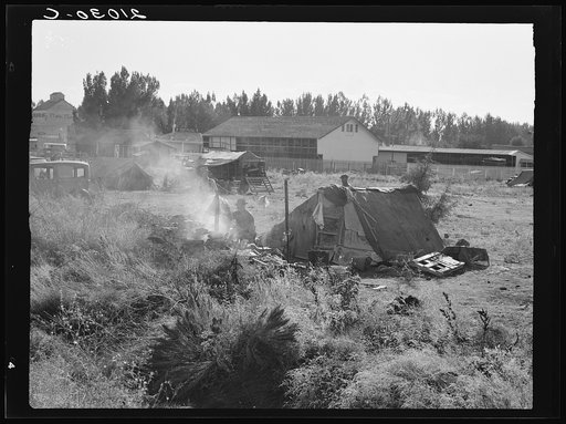 One of the forty potato camps in open field, entering town. Malin, Klamath County, Oregon. General caption number 64
