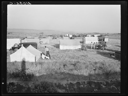 Untitled photo, possibly related to: Families camped on flat before season opens waiting for the Farm Security Administration (FSA) mobile unit to open. No sanitation, no water. Near Merrill, Klamath County, Oregon