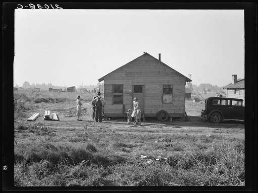 Mother and two children, husband, his brother and brother's wife shown. Near Klamath Falls, Oregon. Rural shack community on outskirts of town. General caption number 47