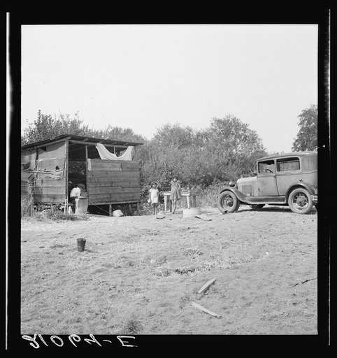 Untitled photo, possibly related to: Grower provides fourteen such shacks in a row for his hop pickers. Josephine County, Oregon. Near Grants Pass, Josephine County, Oregon. General caption number 45-11