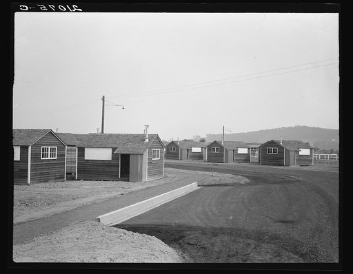 Another view of the newly constructed camp, showing type of shelter units (FSA - Farm Security Administration). Near McMinnville, Yamhill County, Oregon