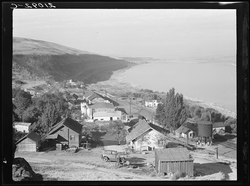Untitled photo, possibly related to: Shows ferry which crosses the Columbia River (Oregon to Washington.) Toll bridges are replacing the ferries which are private enterprises and do not run on schedule. Eastbound freight seen on Washington side