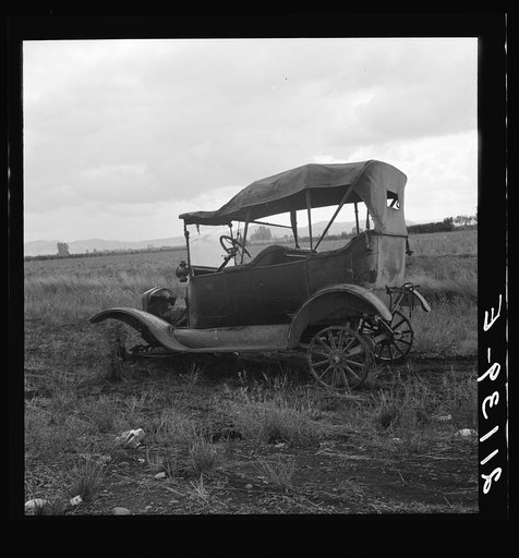 The end of the Model "T" abandoned in open field along Highway 99. North of Eugene, Oregon
