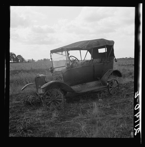 Untitled photo, possibly related to: The end of the Model "T" abandoned in open field along Highway 99. North of Eugene, Oregon