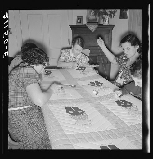 Farm women working on quilt. Near West Carlton, Yamhill County, Oregon. General caption number 58-11