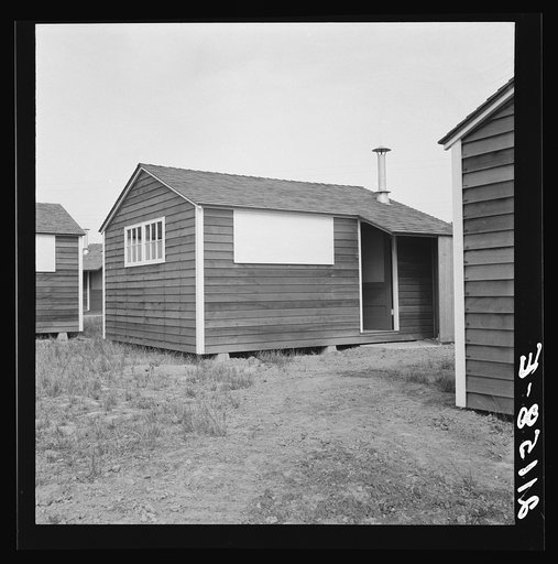 Shows new type of wooden shelter for migratory workers. FSA (Farm Security Administration) camp. Near McMinnville, Oregon. General caption number 60