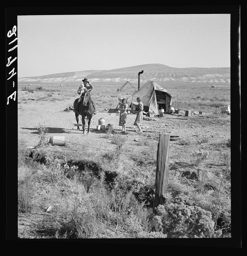 Fairbanks' home. Home Management Supervisor of FSA (Farm Security Administration) tries to persuade wife to screen tent. Willow Creek area, Malheur County, Oregon. General captions 66 and 67
