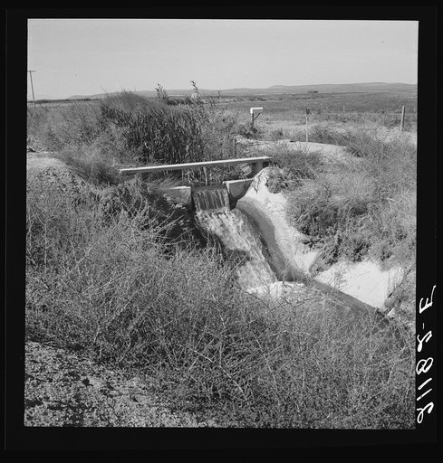 Irrigation ditch, showing drop in canal. Dead Ox Flat, Malheur County, Oregon. General caption number 67-1