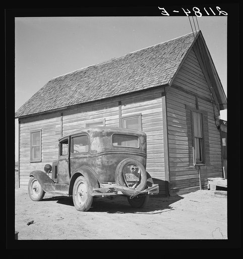 New home of Schroeder family. They left South Dakota three years ago in this car. Dead Ox Flat, Malheur County, Oregon. General caption number 67-111