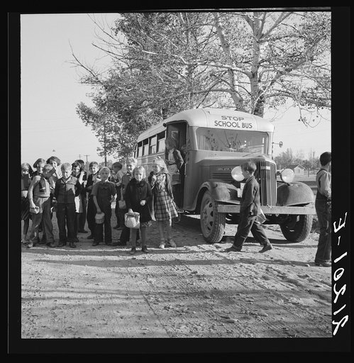 Untitled photo, possibly related to: The children from Dead Ox Flat get off bus at school yard. Ontario, Malheur County, Oregon. General caption number 67-1V