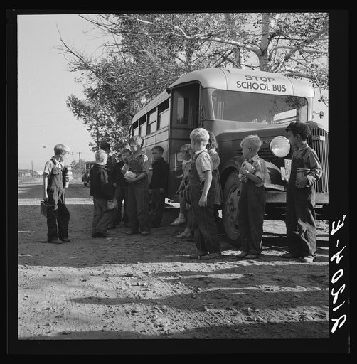 Untitled photo, possibly related to: The children from Dead Ox Flat get off bus at school yard. Ontario, Malheur County, Oregon. General caption number 67-1V