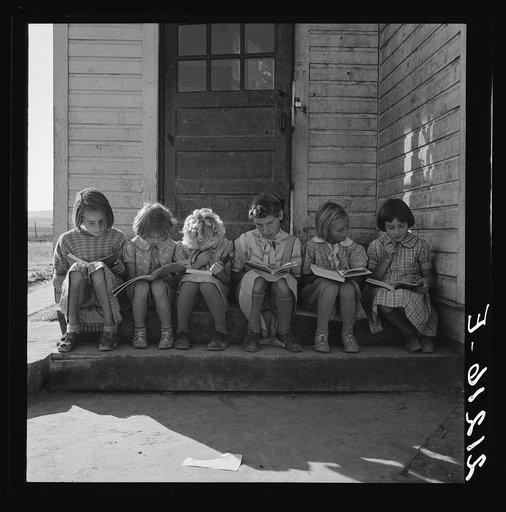 Girls of Lincoln Bench School study their reading lesson. Near Ontario, Malheur County, Oregon