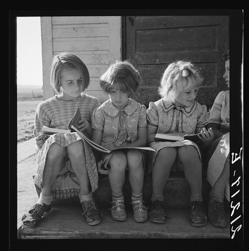 Girls of Lincoln Bench School study their reading lesson. Near Ontario, Malheur County, Oregon
