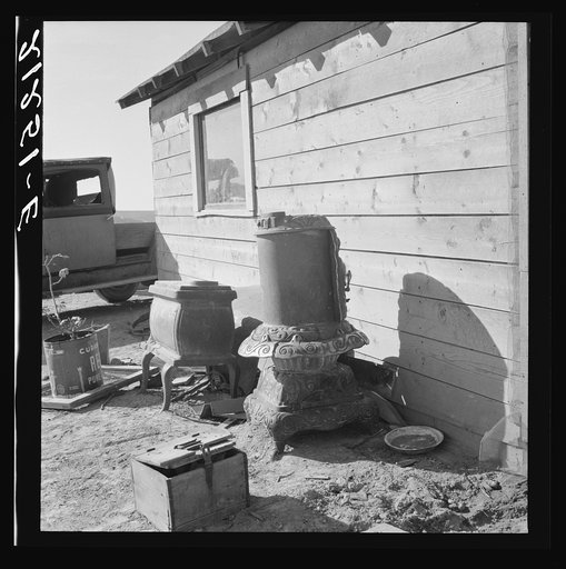 Stoves outside the Browning house being repaired for winter use. Dead Ox Flat, Malheur County, Oregon. General caption 67-111
