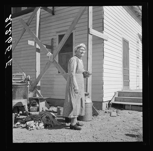 Soper grandmother helps the large family. Willow Creek area, Malheur County, Oregon. General caption number 72