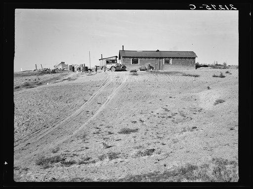 The Browning home, a partial dugout. Seven children live here. Dead Ox Flat, Malheur County, Oregon. General caption number 67