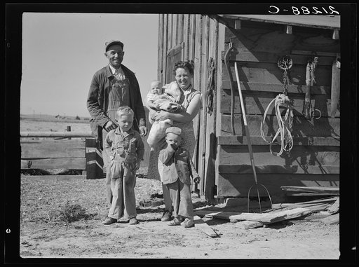 Untitled photo, possibly related to: The Schroeder family on their new farm. When they first came two years ago lived in shed shown. Dead Ox Flat, Malheur County, Oregon