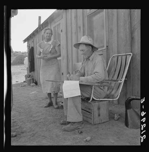 Untitled photo, possibly related to: Oklahoma farmer, now living in Cow Hollow, is a FSA (Farm Security Administration) borrower. Seen here signing his chattel mortgage. Malheur County, Oregon