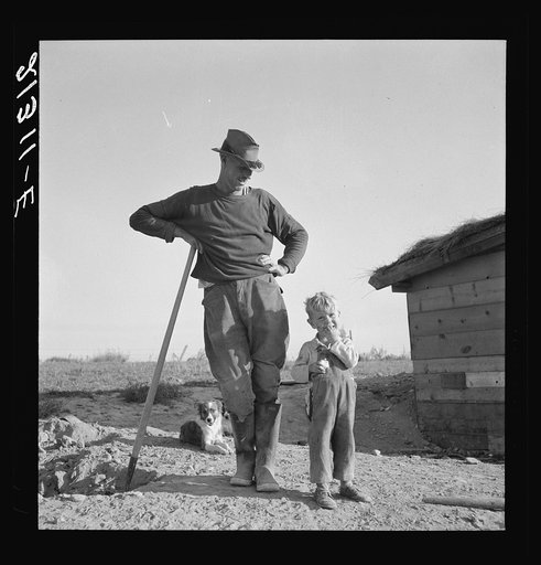 Mr. Dougherty and one of the children. Warm Springs district, Malheur County, Oregon