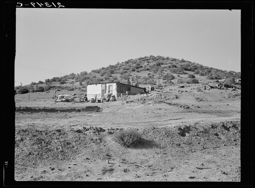 Untitled photo, possibly related to: New farm in Cow Hollow, Malheur County, Oregon. Note basement dugout house and excavation for new house in foreground. See general caption number 66