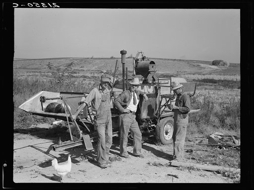 Untitled photo, possibly related to: Stephen brothers. Joe, Jim, Eugene, Fred. All from Nebraska. All good farmers. Their combine purchased by FSA (Farm Security Administration) cooperators loan. Nyssa Heights district, Malheur County, Oregon