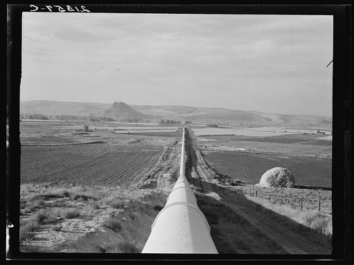 Untitled photo, possibly related to: Siphon--the world's longest--which carries water five miles to Dead Ox Flat. It is eight feet in diameter. Malheur County, Oregon