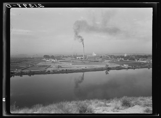 Untitled photo, possibly related to: Sugar beet factory (Amalgamated Sugar Company) along Snake River. Nyssa, Malheur County, Oregon, a one factory town. General Caption number 70