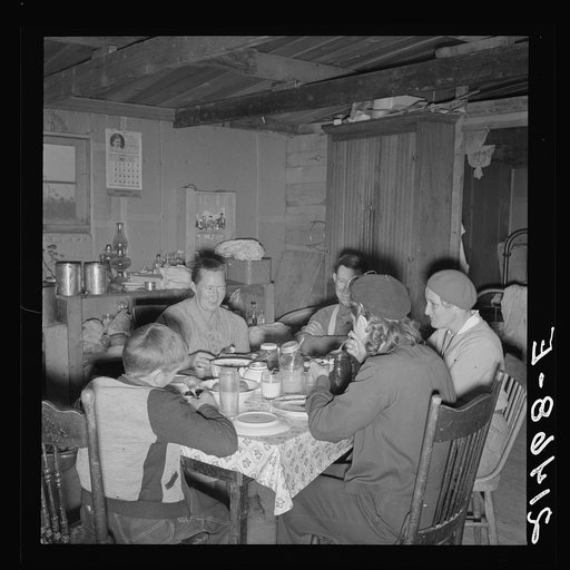 Untitled photo, possibly related to: Mr. Wardlow says grace before dinner. Dead Ox Flat, Malheur County, Oregon