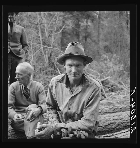 Member of the co-op in the woods. Ola self help cooperative sawmill. Gem County, Idaho. See general caption 48