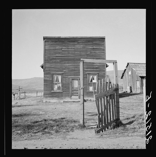 Farmer saloon and stagecoach tavern which is the temporary home of a member of the Ola self help sawmill co-op. Gem County, Idaho. General caption 48