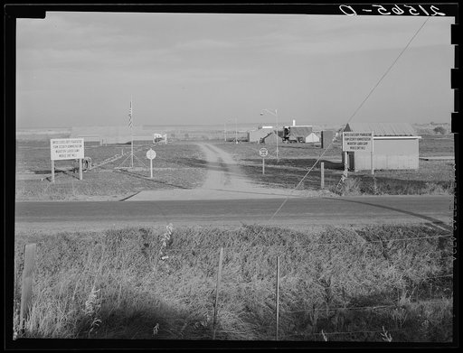 Untitled photo, possibly related to: Entrance to Nyssa Farm family labor camp, FSA (Farm Security Administration) mobile unit number 1, just established before opening of beet season. Near Nyssa, Oregon