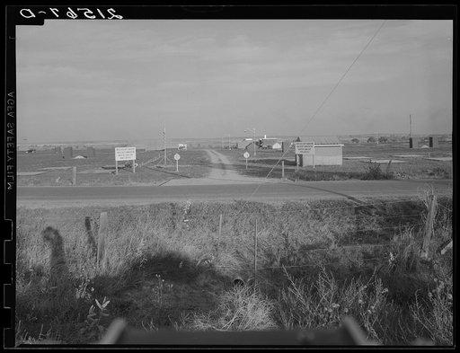 Untitled photo, possibly related to: Entrance to Nyssa Farm family labor camp, FSA (Farm Security Administration) mobile unit number 1, just established before opening of beet season. Near Nyssa, Oregon