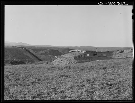 The Daugherty home. Note siphon which brings irrigation water from the opposite bench. Warm Springs district, Malheur County, Oregon. General caption 74