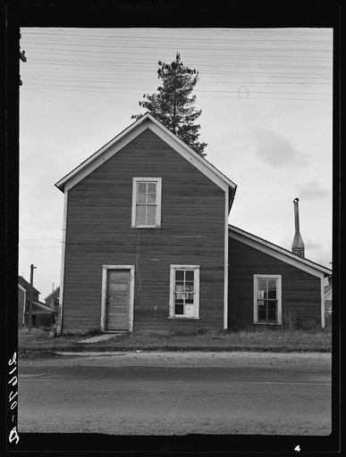 Untitled photo, possibly related to: Sandpoint, Bonner County, Idaho. Many of those dependent on the mill have turned to small stump farming and many have been forced on relief. In this town the Humbird Lumber Company shut down in 1930
