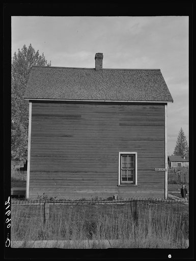 Untitled photo, possibly related to: Sandpoint, Bonner County, Idaho. Many of those dependent on the mill have turned back to small stump farming and many have been forced on relief. In this town the Humbird Lumber Company shut down in 1930. General caption 49