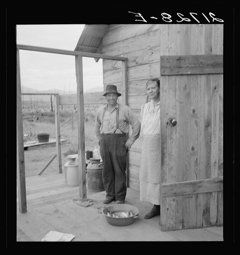 Untitled photo, possibly related to: New settler shows fish he caught this morning. He "likes it fine here." Priest River Valley, Bonner County, Idaho. See general caption 54