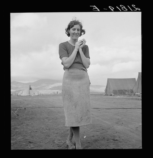 Young migrant mother has just finished washing. Merrill FSA (Farm Security Administration) camp, Klamath County, Oregon. See general caption 62