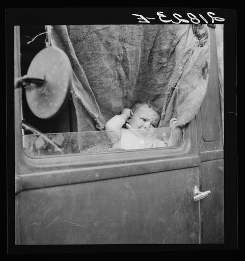 Baby from Mississippi parked in truck at FSA (Farm Security Administration) camp, Merrill, Oregon. See general caption 62