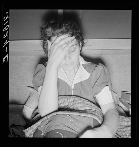 Sick woman awaits visit of the doctor. Merrill FSA (Farm Security Administration) camp, Klamath County, Oregon
