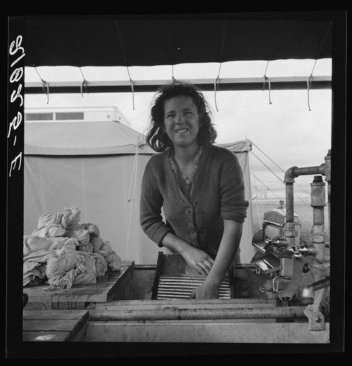 Young migrant girl makes use of facilities provided for cleanliness. Merrill FSA (Farm Security Administration) camp, Klamath County, Oregon. See general caption 62