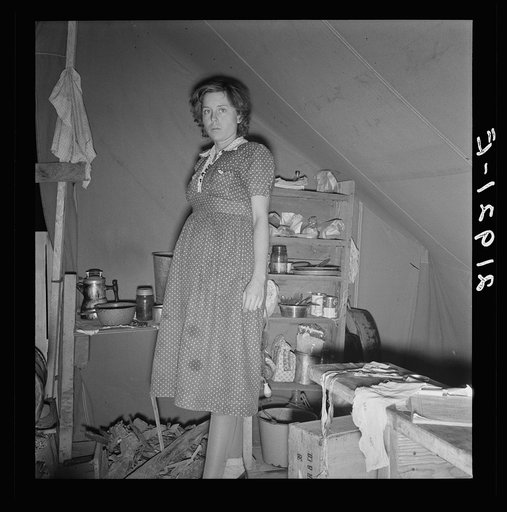 Young mother, aged twenty-two, has one little girl three years old. Merrill, Klamath County, Oregon. In mobile unit of FSA (Farm Security Administration) camp. New baby expected in December. During this year she has worked with her husband in: strawberries (Helvetia, Oregon); cherries (Salem, Oregon