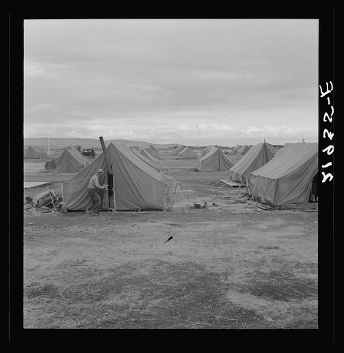 Untitled photo, possibly related to: Nurse making her rounds, late in the afternoon. Merrill, Klamath County, Oregon. Unit of FSA (Farm Security Administration) mobile camp