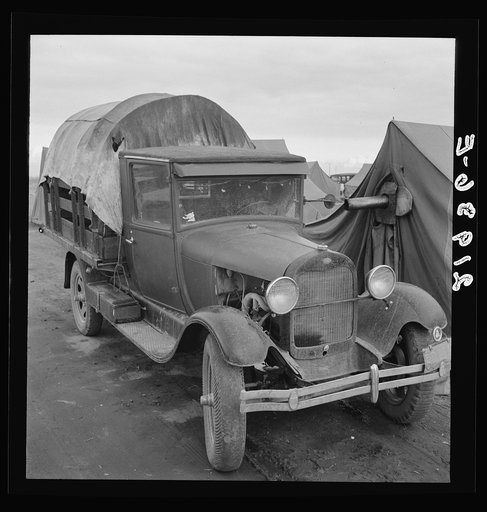 Untitled photo, possibly related to: Truck, baby parked on front seat. Merrill, Klamath County, Oregon, in FSA (Farm Security Administration) camp