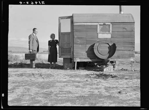 The camp nurse introduces doctor to mother of sick baby. Merrill, Klamath County, Oregon. FSA (Farm Security Administration) camp unit