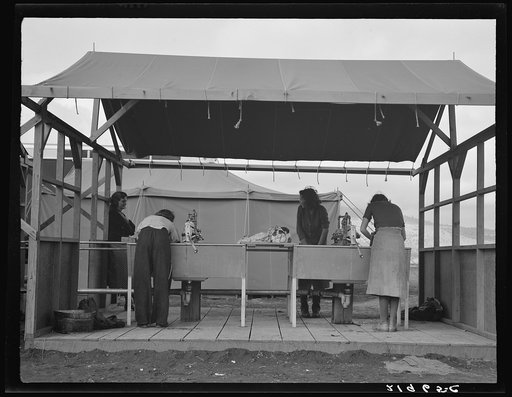 Portable laundry unit, with shower bath unit behind. Merrill, Klamath County, Oregon. FSA (Farm Security Administration) camp