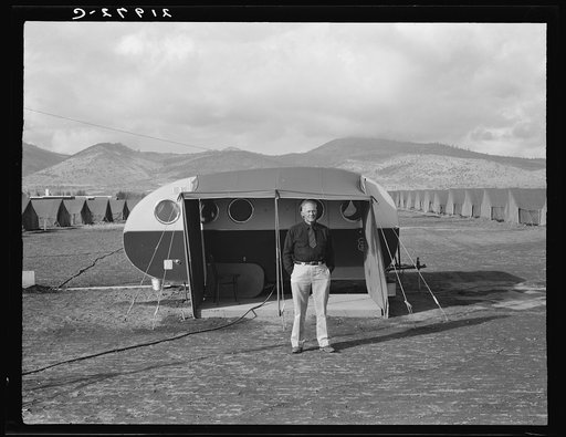 Untitled photo, possibly related to: The camp manager, the office trailer and view of mobile camp (FSA - Farm Security Administration). Merrill, Klamath County, Oregon