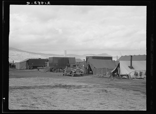 Shows pickers' tents, power unit and shower bath unit beyond. Merrill, Klamath County, Oregon. FSA (Farm Security Administration) camp