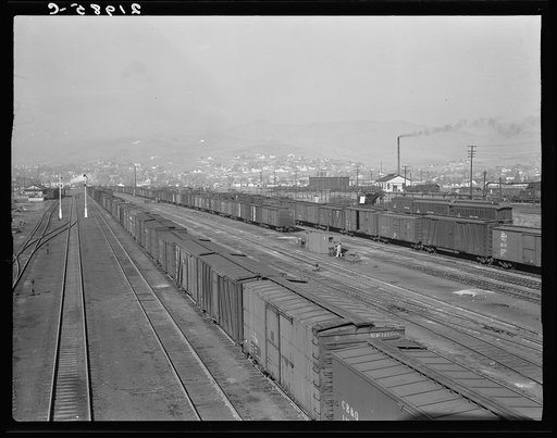 Railroad yard, outskirts of fast-growing town. Klamath Falls, Oregon